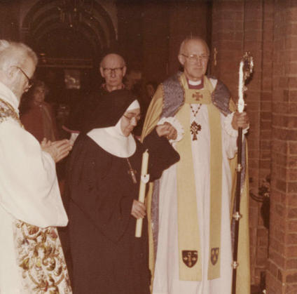 Mother Mary Magdalene being led to her anchorhold by the Bishop of Norwich, 1982